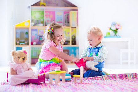 Kids playing with Doll House and Stuffed animal